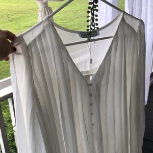 Vici white pleated romper.